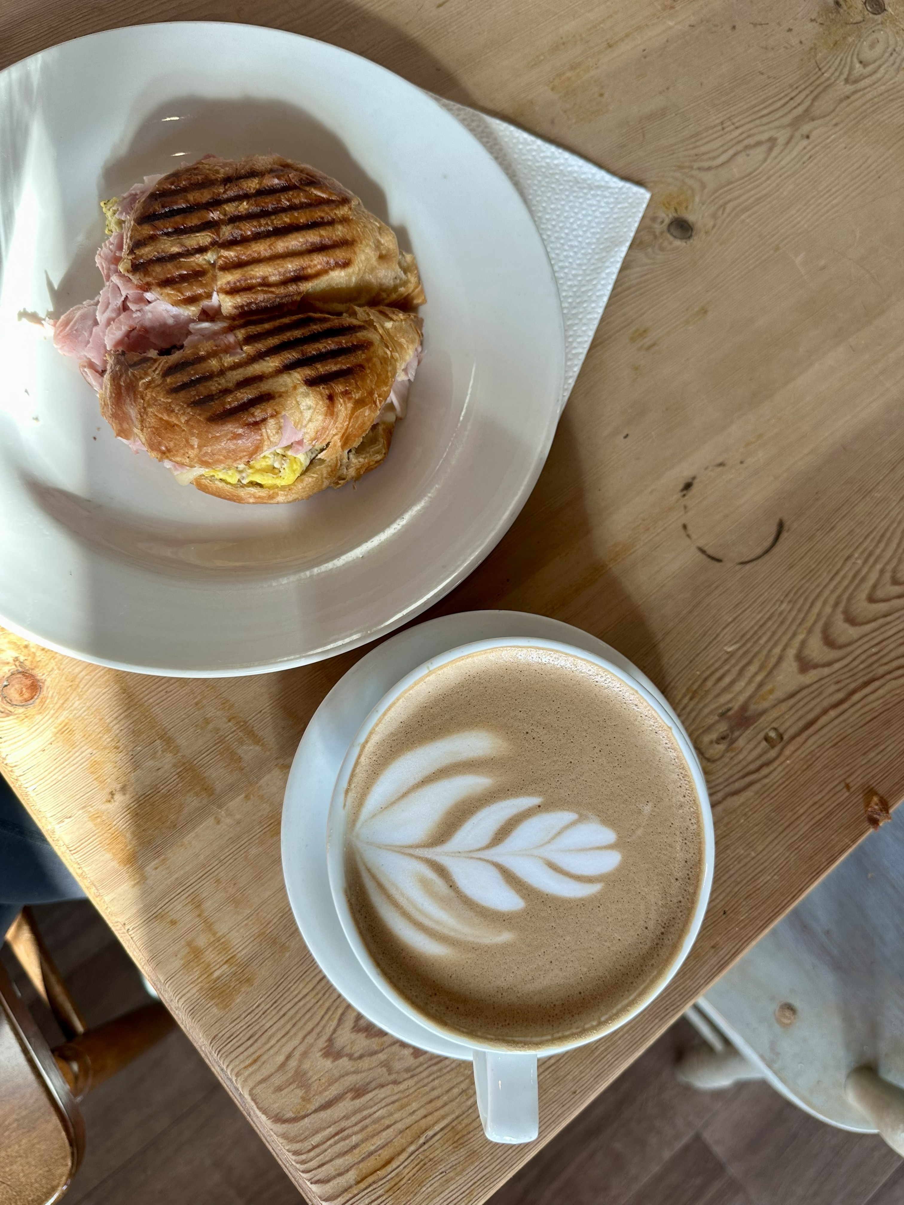 A latte and breakfast sandwich at Midtown Coffee in Columbus, Georgia.